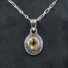 Ornate Oval Gemstone Pendant with Rope Design