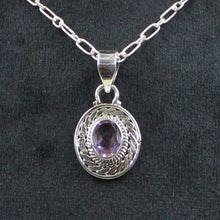 Ornate Oval Gemstone Pendant with Rope Design