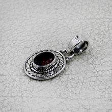 Ornate Oval Gemstone Pendant with Rope Design