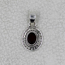 Ornate Oval Gemstone Pendant with Rope Design