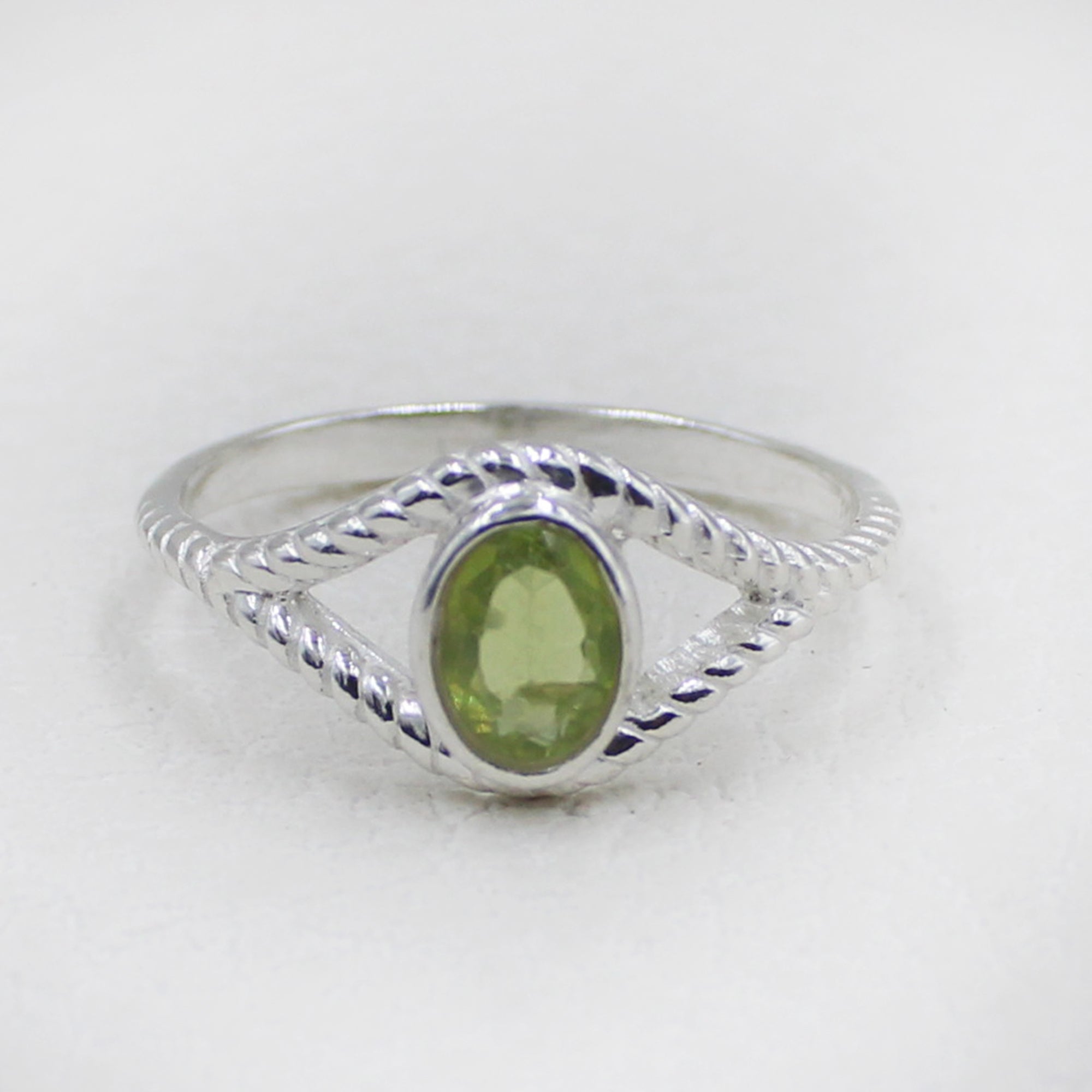 Sterling Silver Twisted Band Ring with Oval Peridot Gemstone