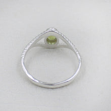 Sterling Silver Twisted Band Ring with Oval Peridot Gemstone