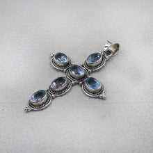 Sterling Silver Cross Pendant with Blue Topaz Oval Gemstones