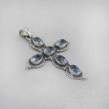 Sterling Silver Cross Pendant with Blue Topaz Oval Gemstones