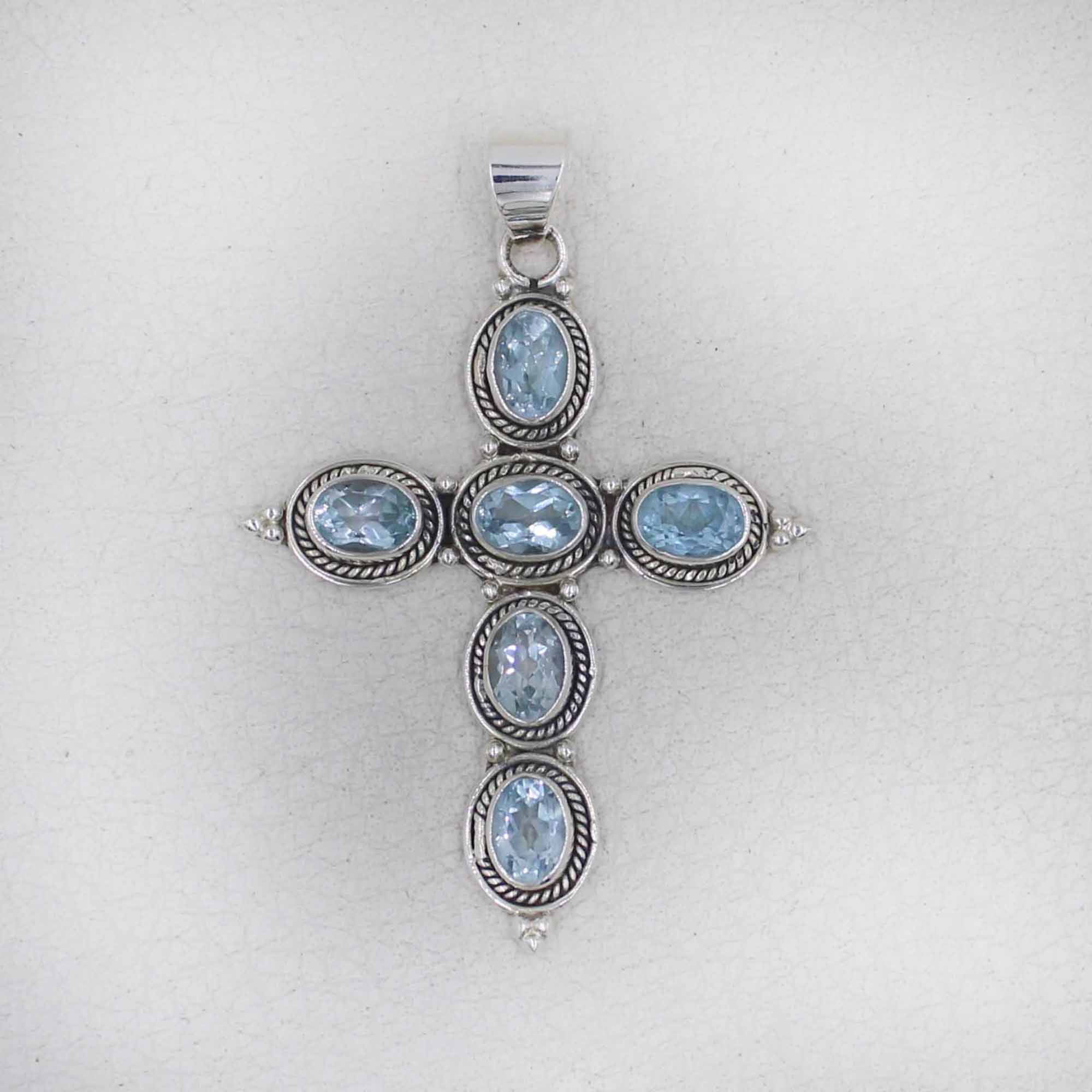 Sterling Silver Cross Pendant with Blue Topaz Oval Gemstones
